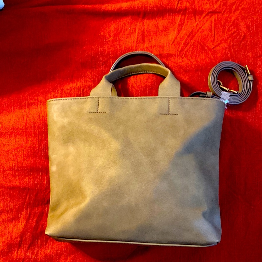 Never used small to medium purse with shoulder strap